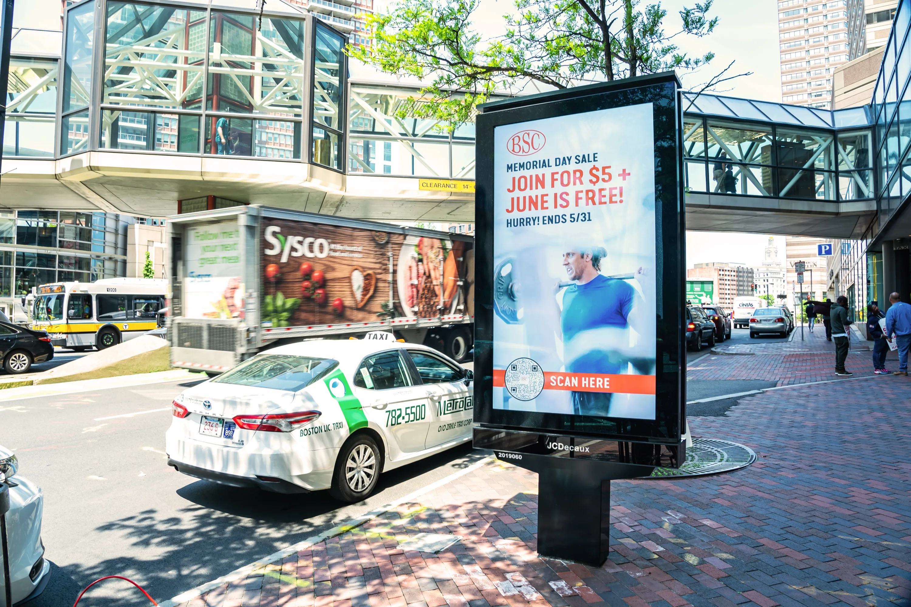 BSC street kiosk ad for a Memorial Day sale