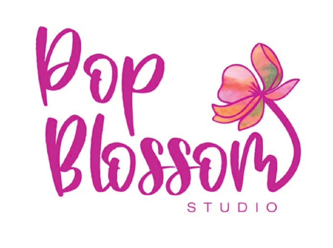 Pop Blossom Studio logo: magenta hand lettering with a watercolor flower